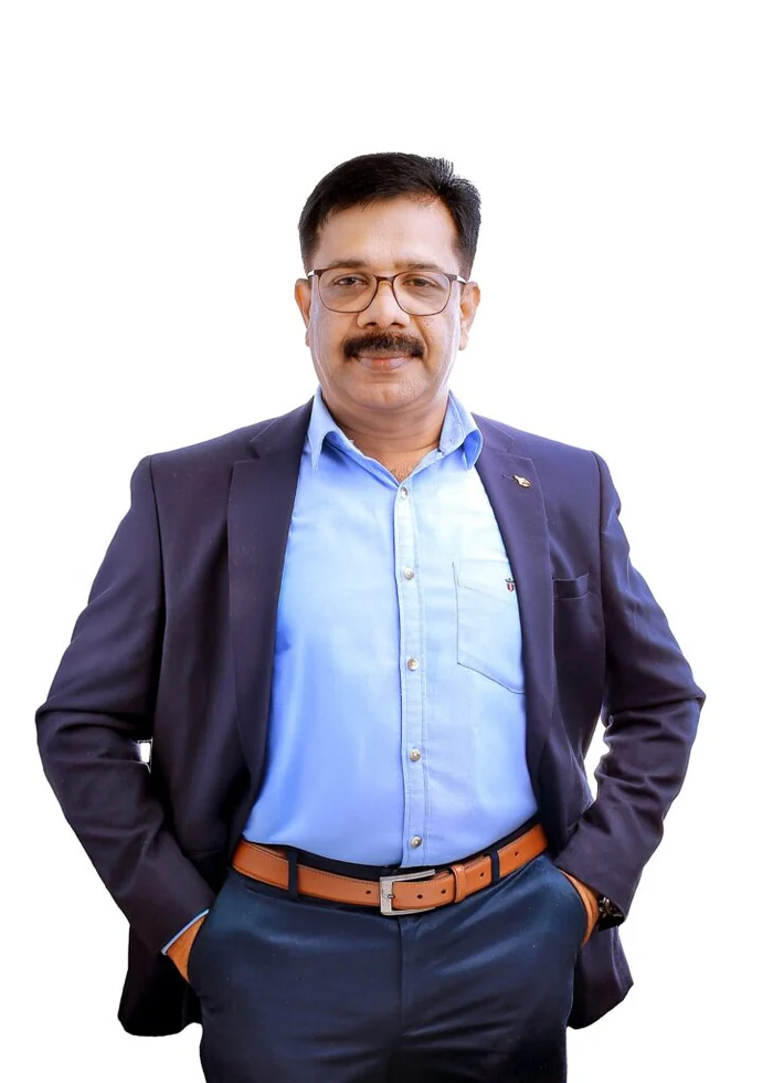 Shaji Cosmos standing portrait